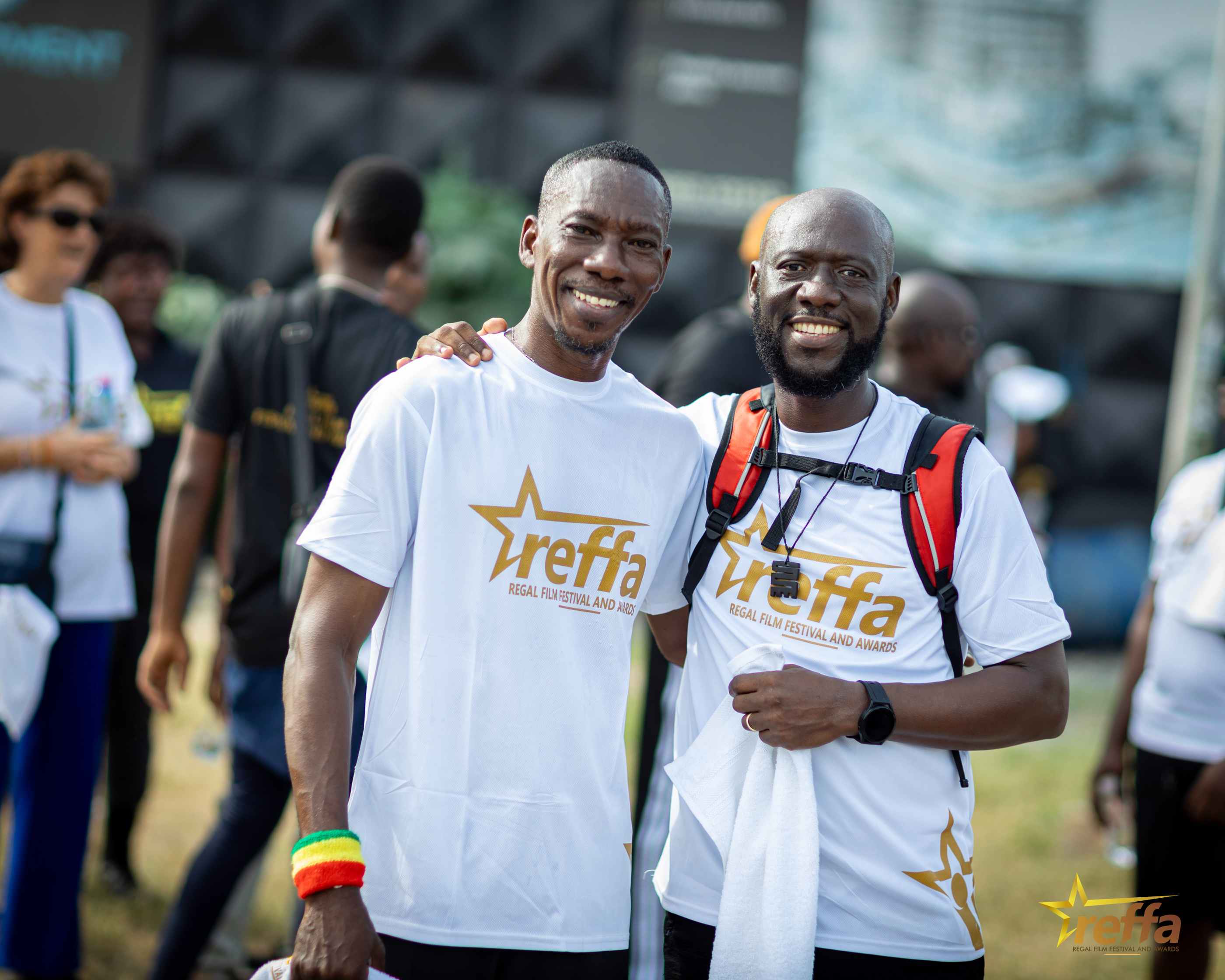 Two walkers in REFFA shirts smiling